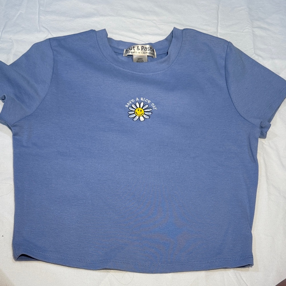 Blue smiley baby tee